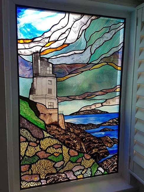 Stained Glass Window Depicting A Castle On A Cliff